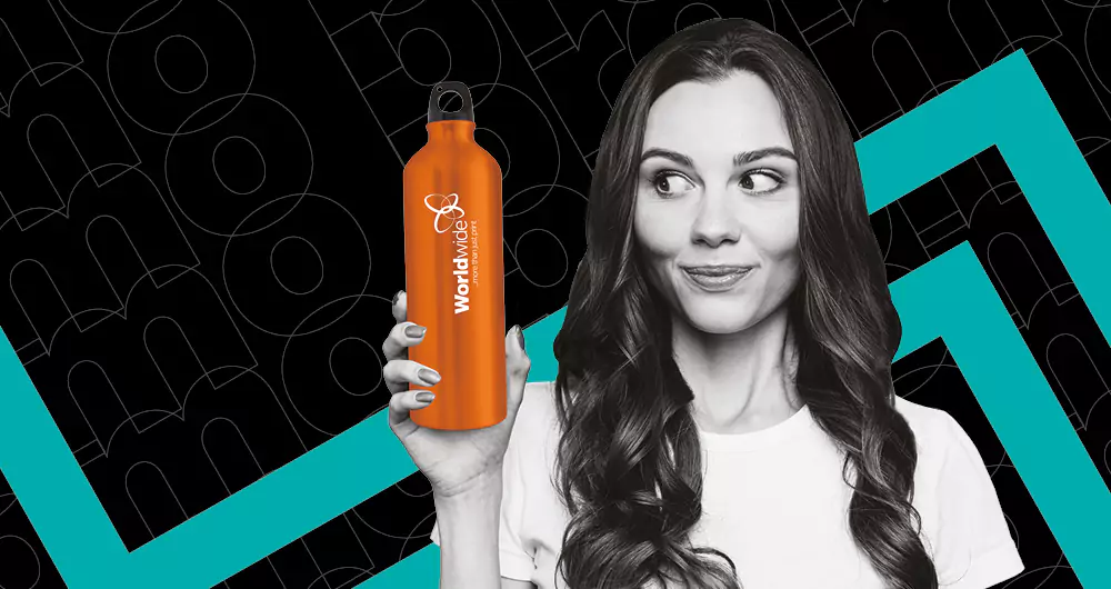 Woman holding branded promotional drink bottle