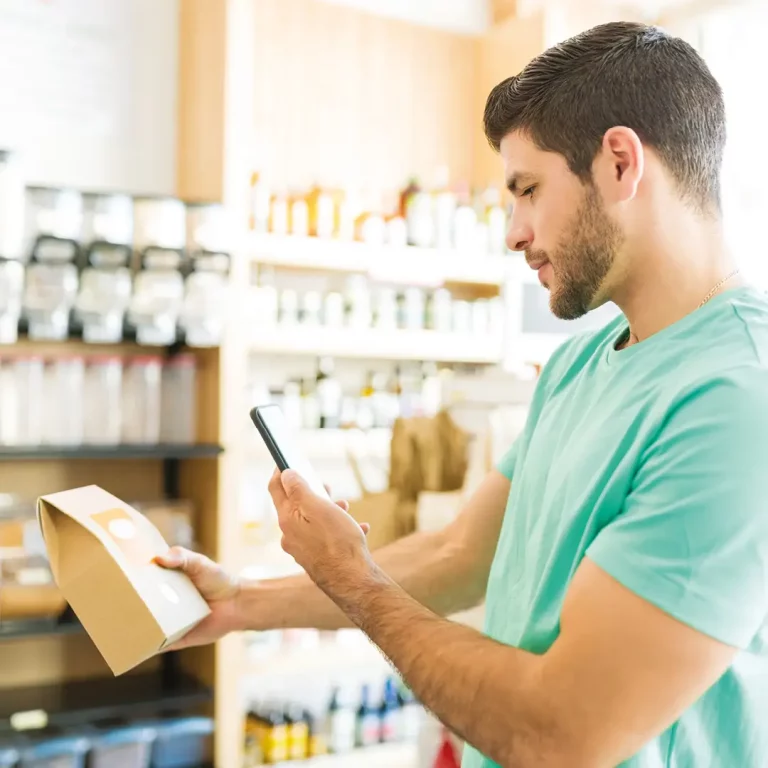 Man using augmented reality on packaging