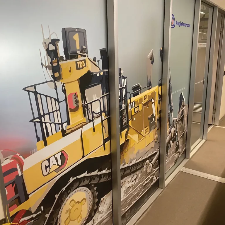Conference room with frosted machinery wall graphics