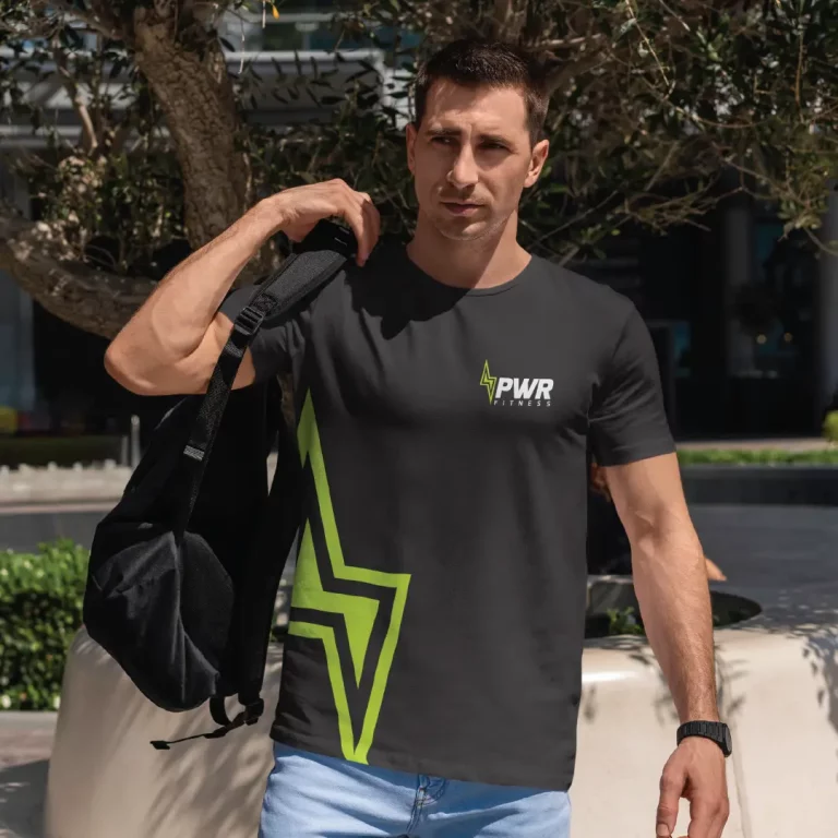 Man wearing PWR branded T-shirt